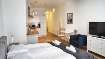 Fer et planche à repasser, lits bébé (en supplément)