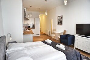 Estudio | Tabla de planchar con plancha, cunas, camas extra y wifi gratis 