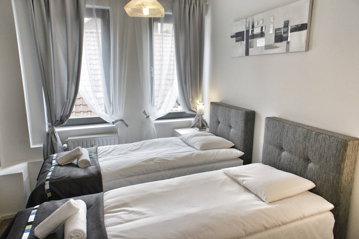 Appartement, 2 slaapkamers | Een strijkplank/strijkijzer, babybedden (toeslag)