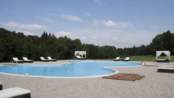 Outdoor pool, open 8:00 AM to 7:00 PM, pool umbrellas, pool loungers
