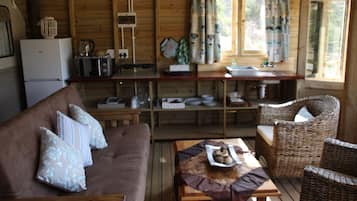 Cabin, River View, Lakeside | Living area | Fireplace