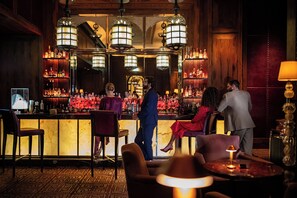 3 bars/lounges, poolside bar, beach bar