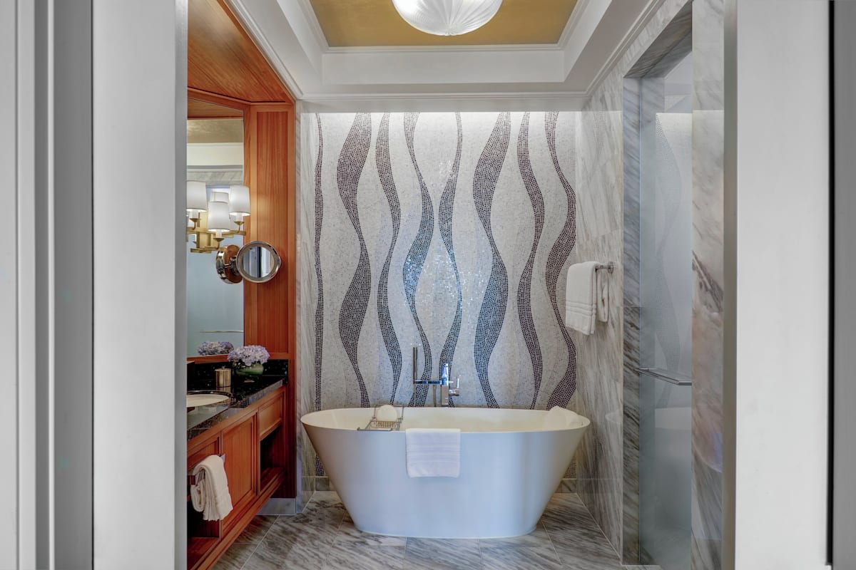 Separate bathtub and shower, deep-soaking bathtub, rainfall showerhead