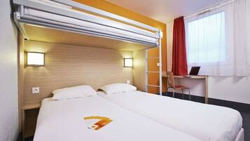 Down comforters, desk, blackout drapes, soundproofing