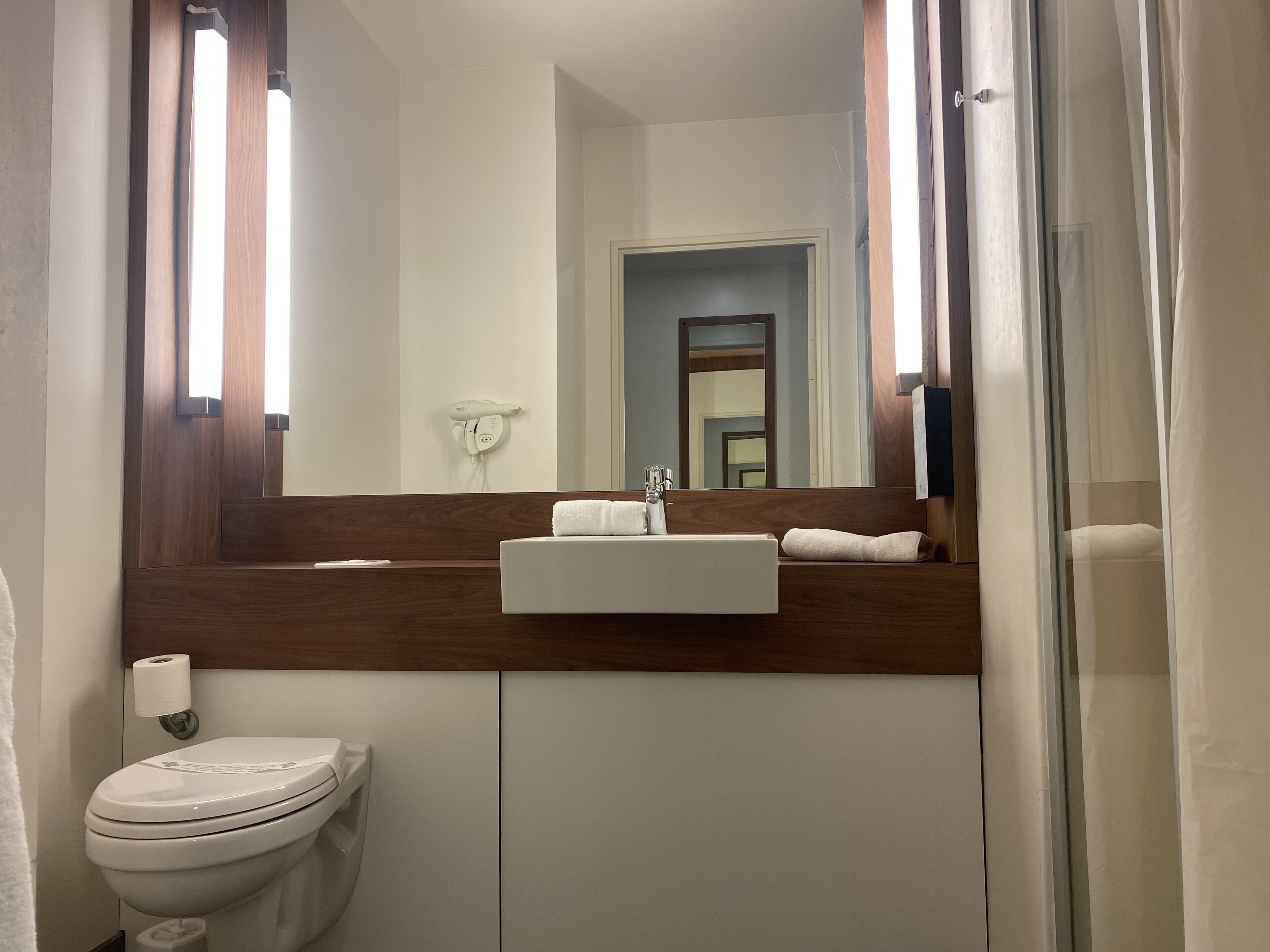 next generation, room, multiple beds | bathroom | hydromassage showerhead, eco-friendly toiletries, hair dryer, towels