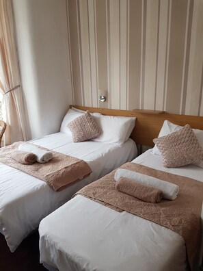 Comfort Triple Room (with Shower ) | Free WiFi, bed sheets