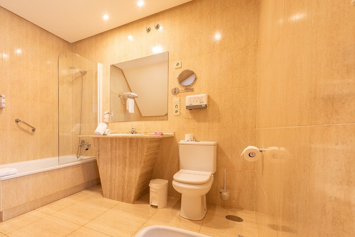 free toiletries, hair dryer, bidet, towels