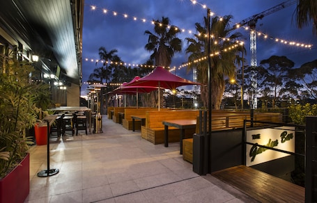Terrace/patio. Nightcap at the Ranch Hotel