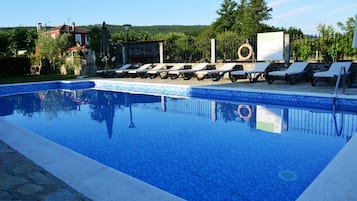 Outdoor pool, sun loungers