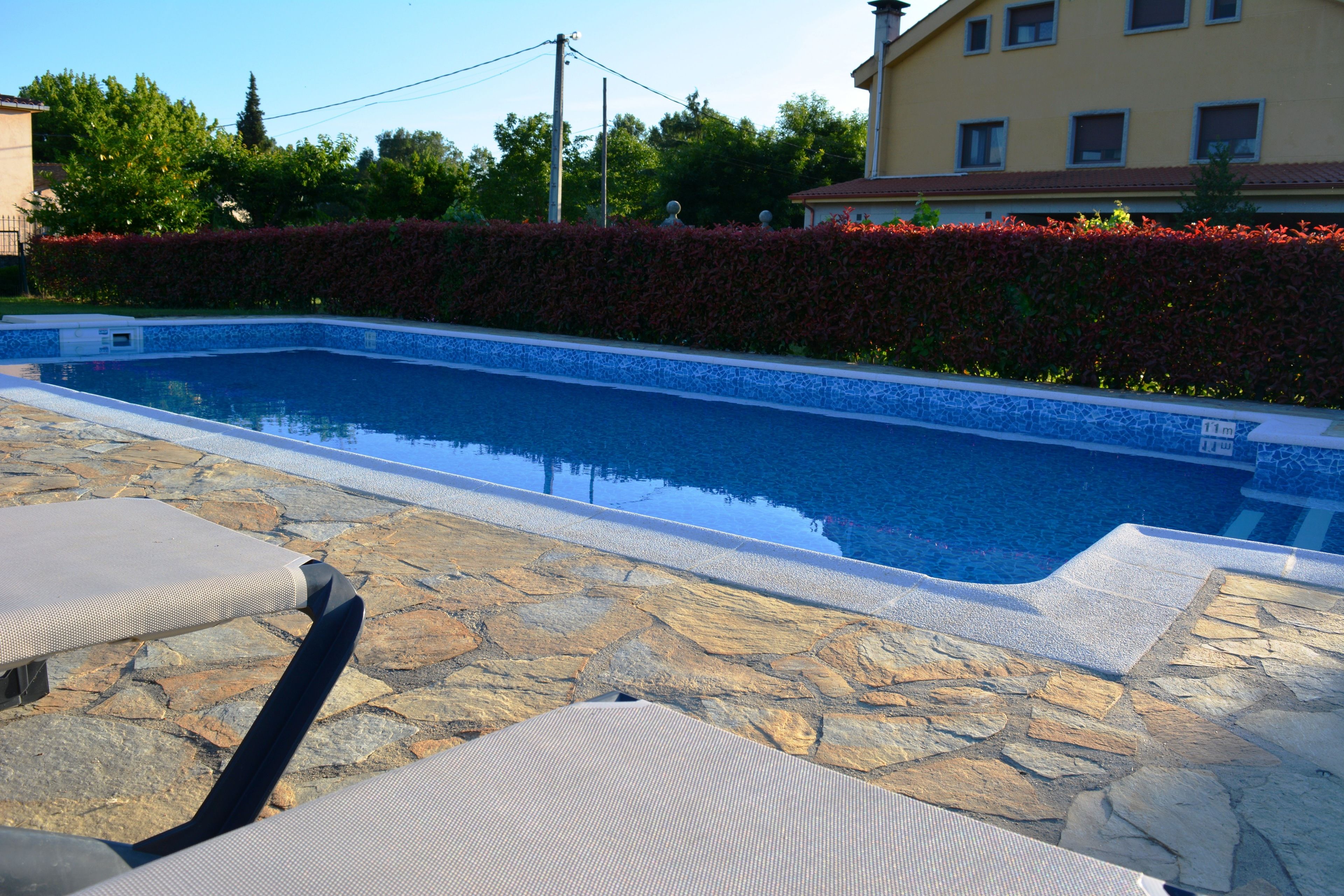 outdoor pool, pool loungers