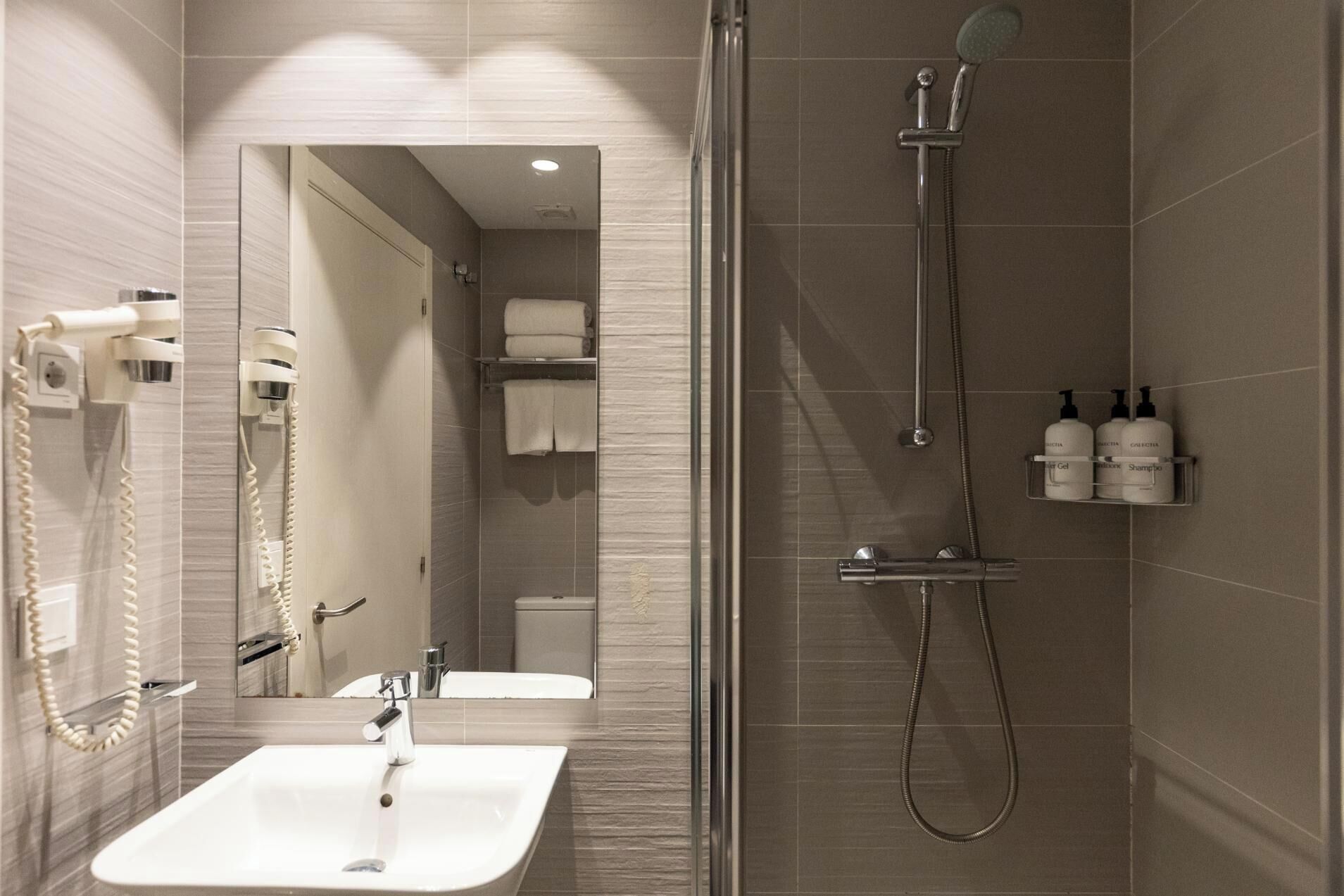 double room | bathroom | designer toiletries, hair dryer, towels, soap
