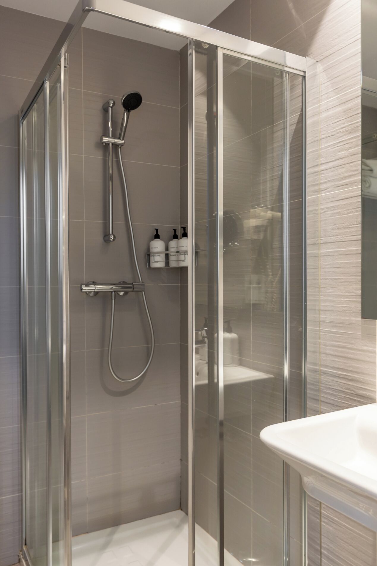 double room single use | bathroom | designer toiletries, hair dryer, towels, soap