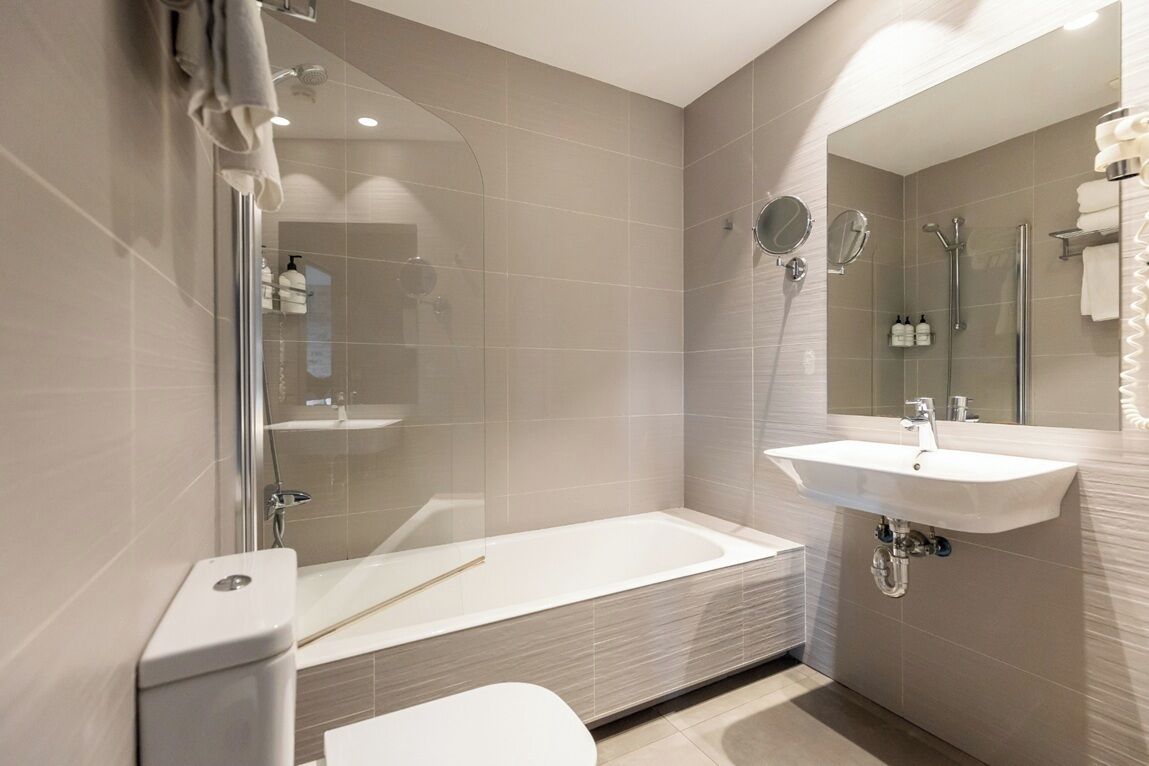 triple room | bathroom | designer toiletries, hair dryer, towels, soap