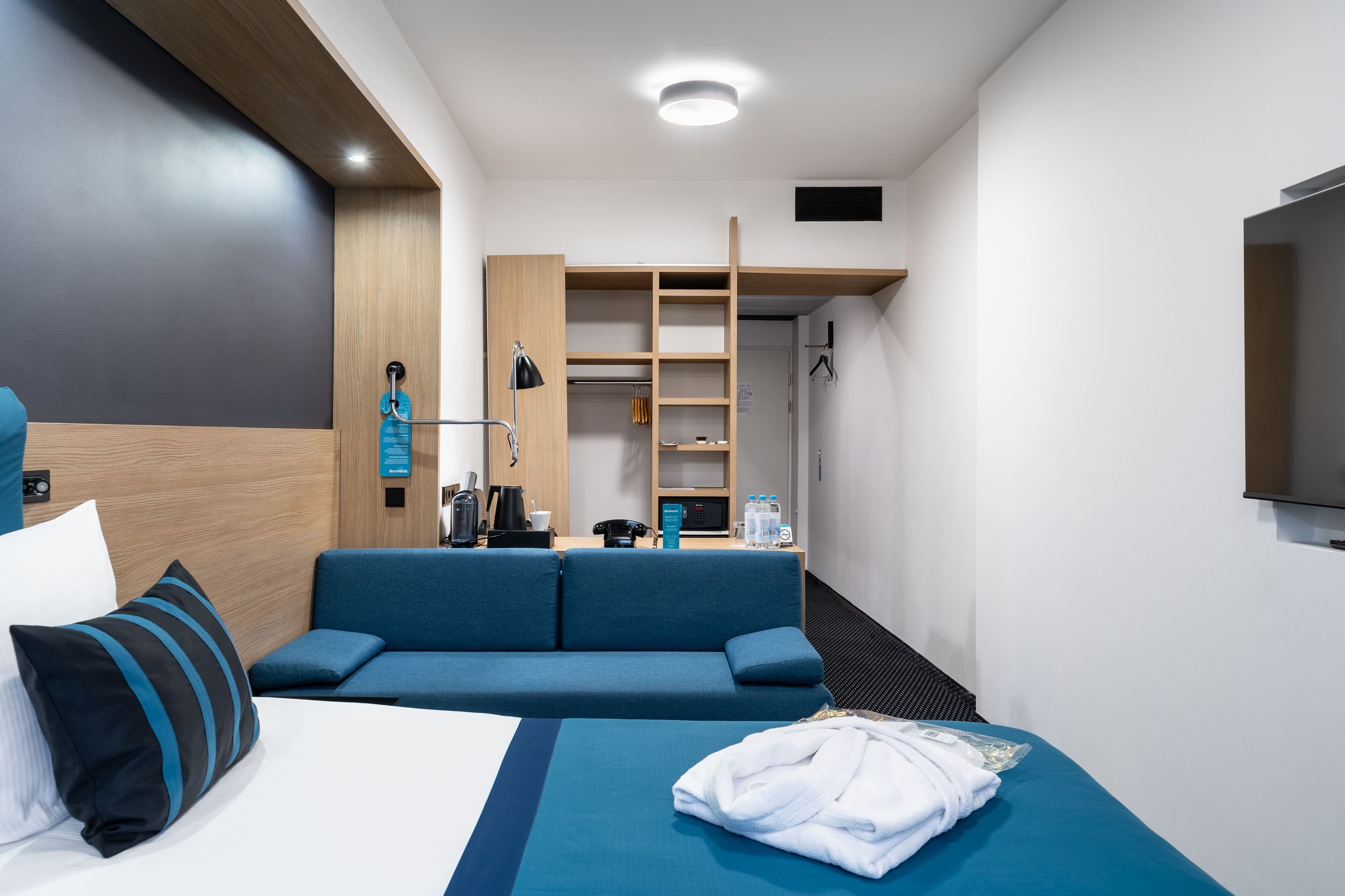 Studio | Premium bedding, down comforters, memory foam beds, minibar