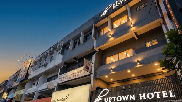 A multi-story building with a prominent 'UPTOWN HOTEL' sign. - De UPTOWN Hotel @ Damansara Uptown (Petaling Jaya)