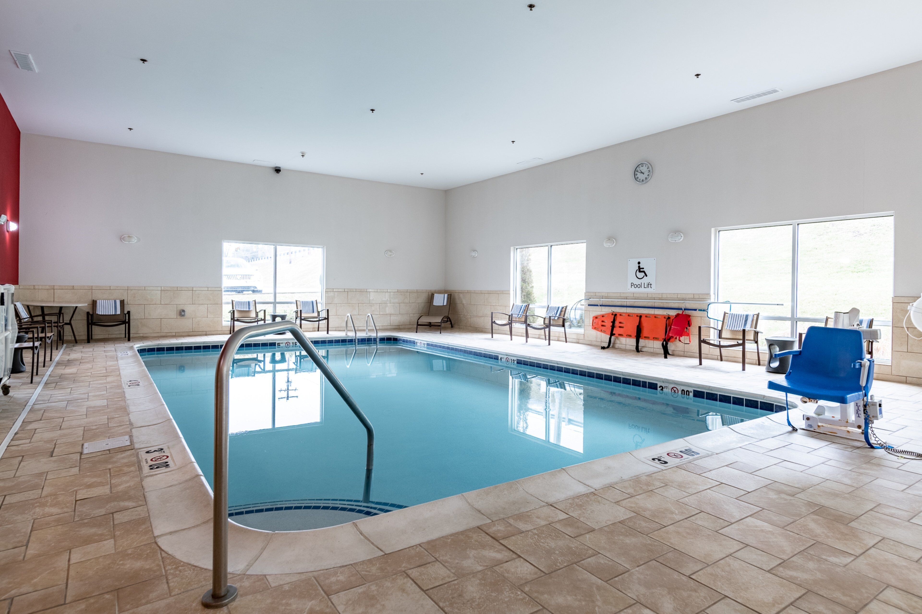 Indoor pool, pool umbrellas, sun loungers