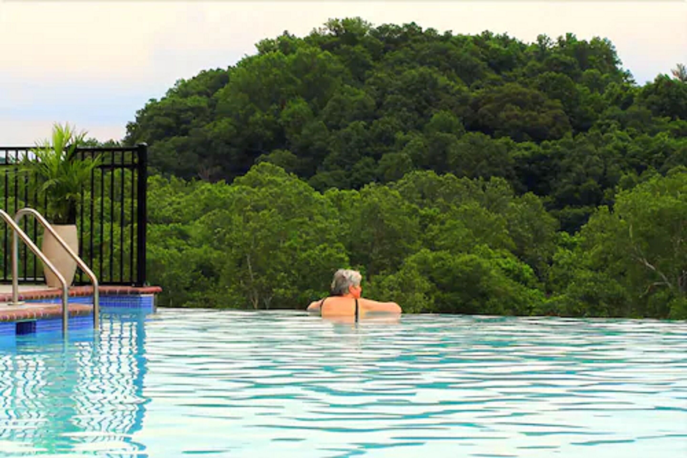 seasonal outdoor pool, pool umbrellas, pool loungers