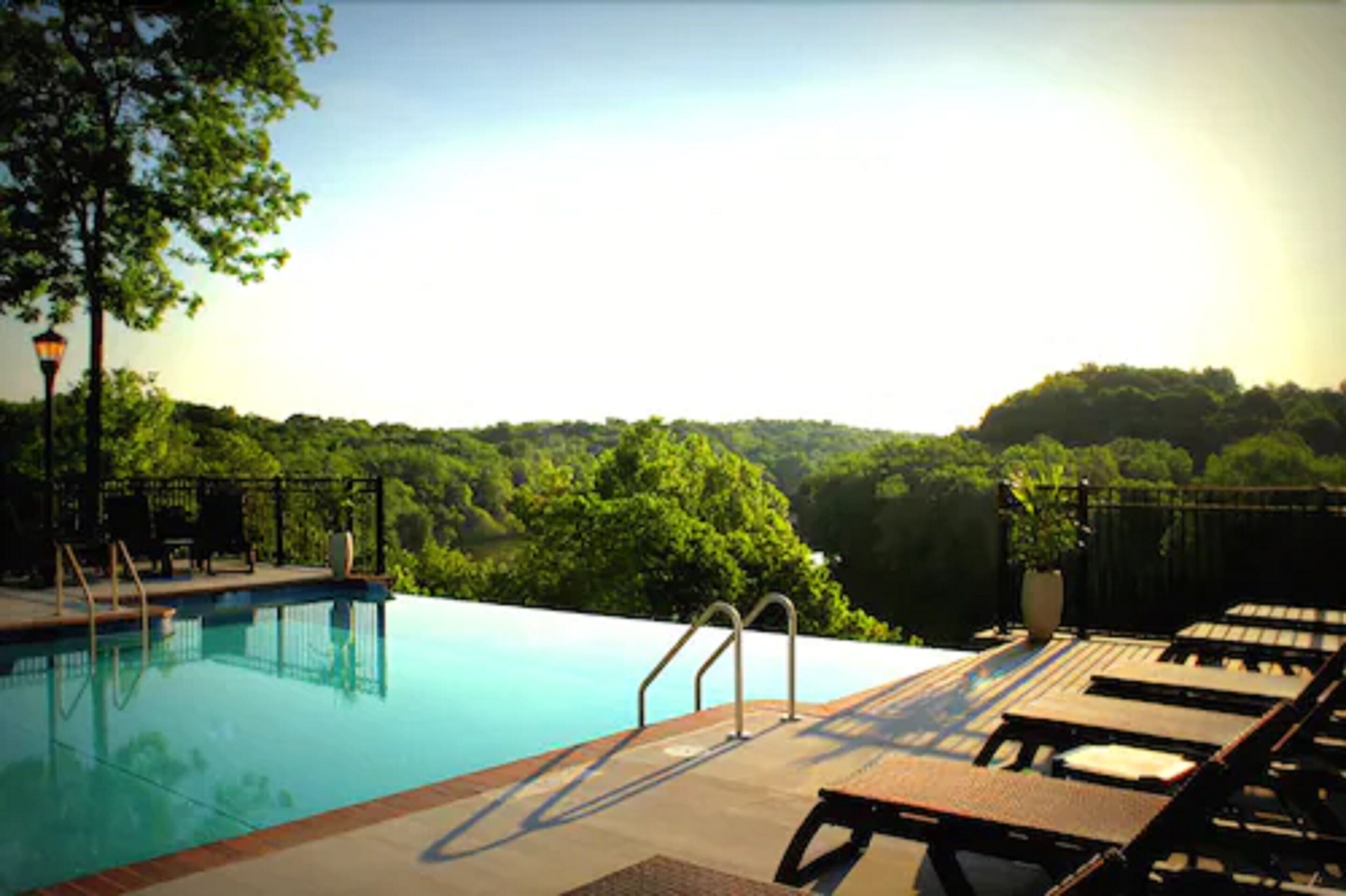 seasonal outdoor pool, pool umbrellas, pool loungers