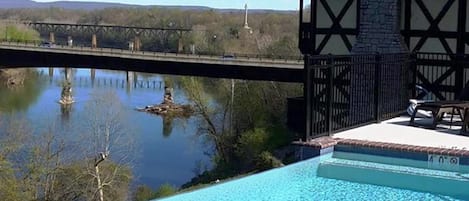 Seasonal outdoor pool, pool umbrellas, pool loungers