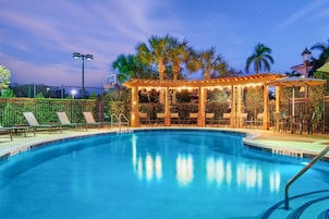 Outdoor pool, open 8:00 AM to 10:00 PM, pool umbrellas, pool loungers