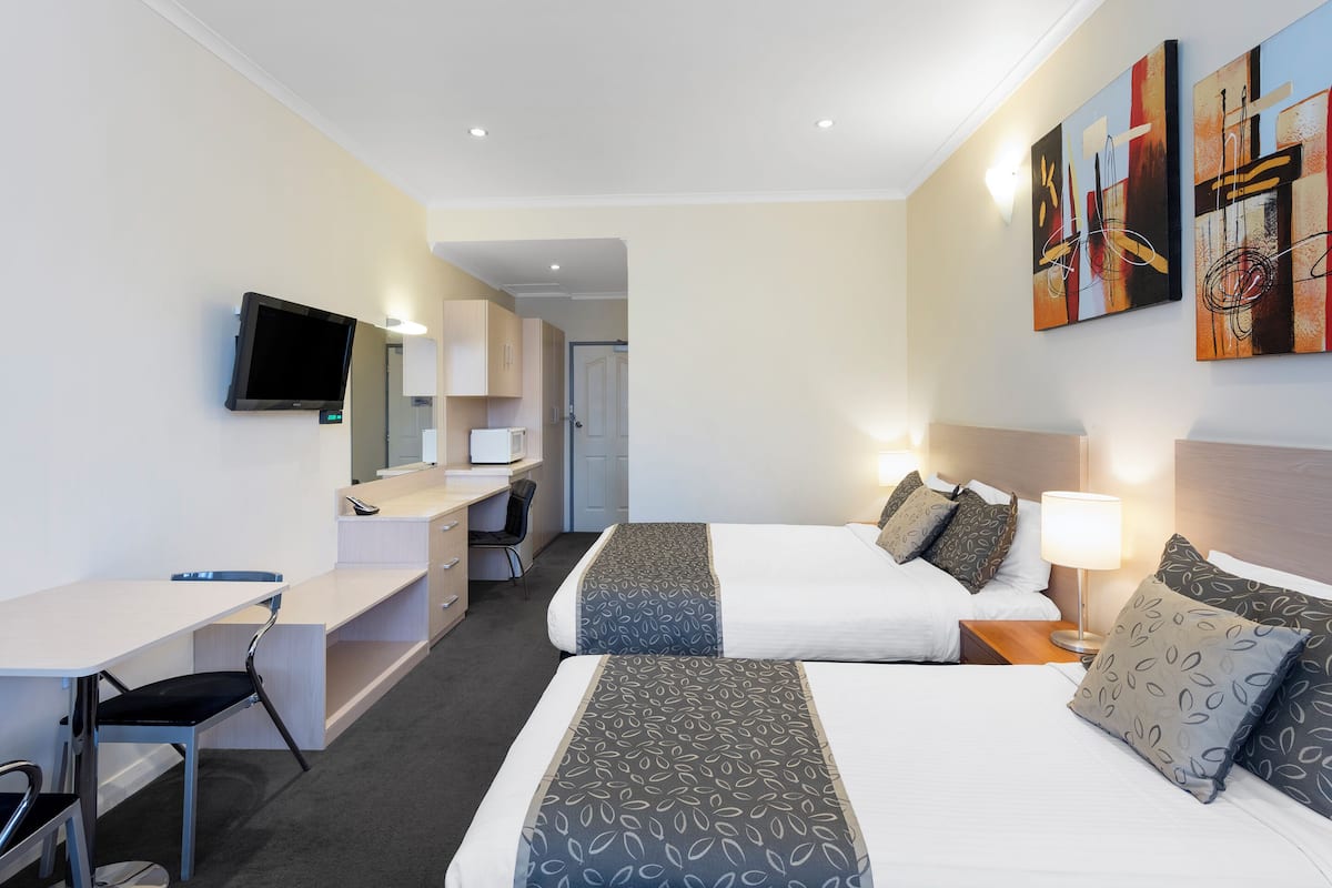 Suite ejecutiva, varias camas | 1 habitación y ropa de cama de alta calidad