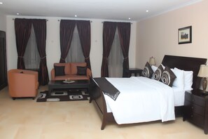Desk, laptop workspace, bed sheets - TOC Hotel (Lekki)