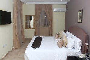 Desk, laptop workspace, bed sheets - TOC Hotel (Lekki)
