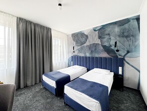 Premium-Doppel- oder -Zweibettzimmer