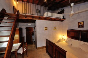 Classic Quadruple Room, 1 Bedroom, Private Bathroom | Down duvets, individually furnished, soundproofing, free WiFi