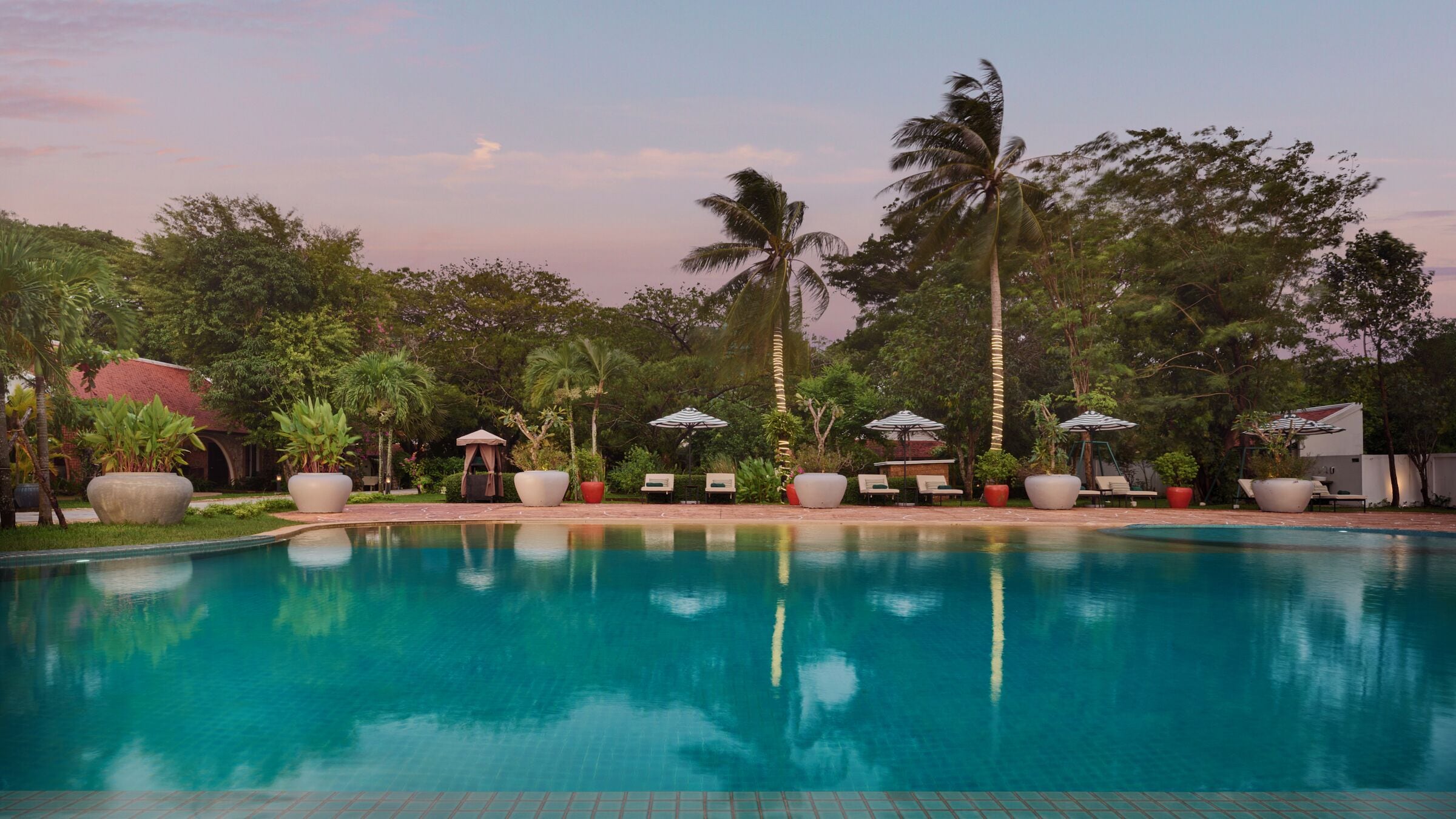 outdoor pool, pool umbrellas, pool loungers