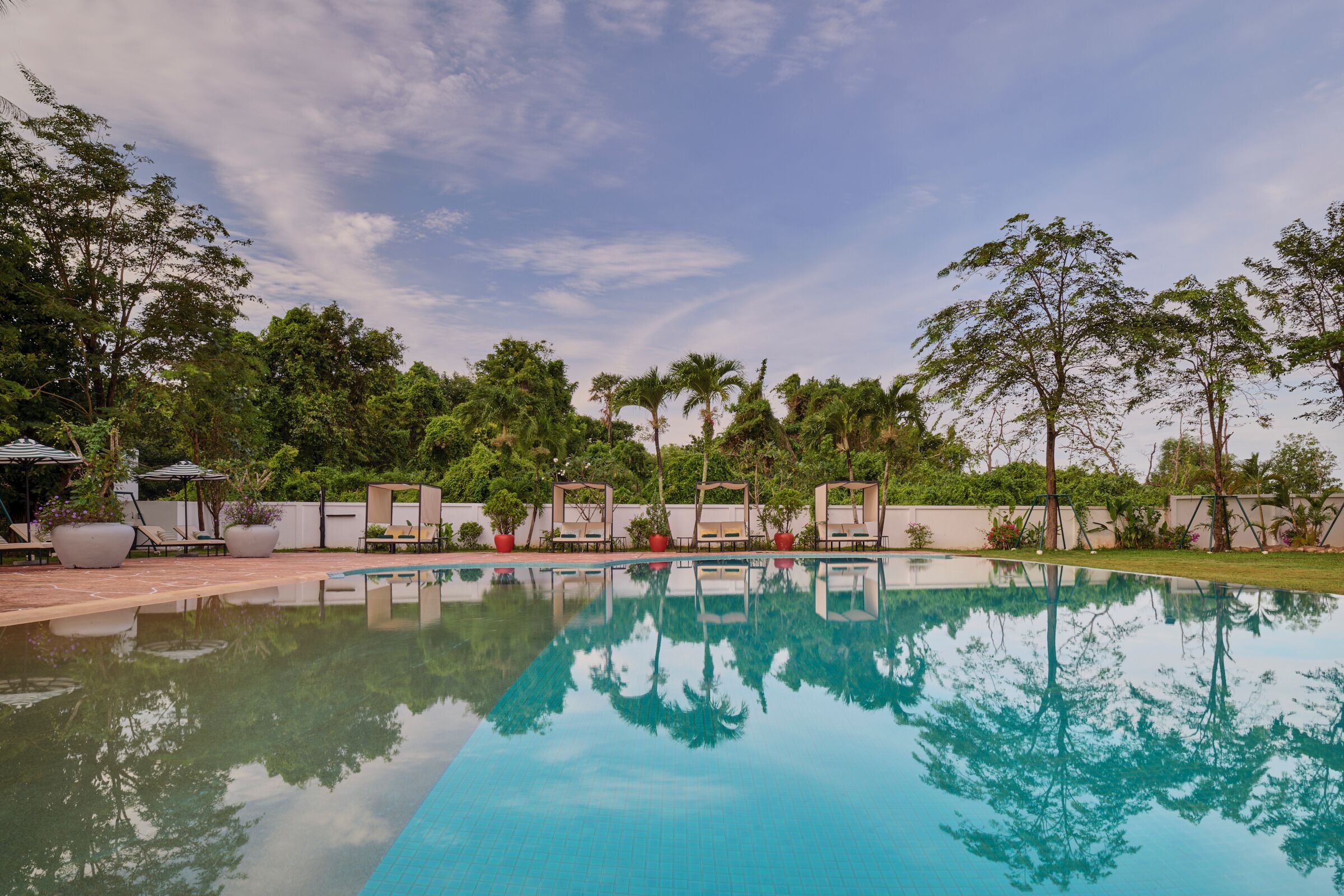 outdoor pool, pool umbrellas, pool loungers