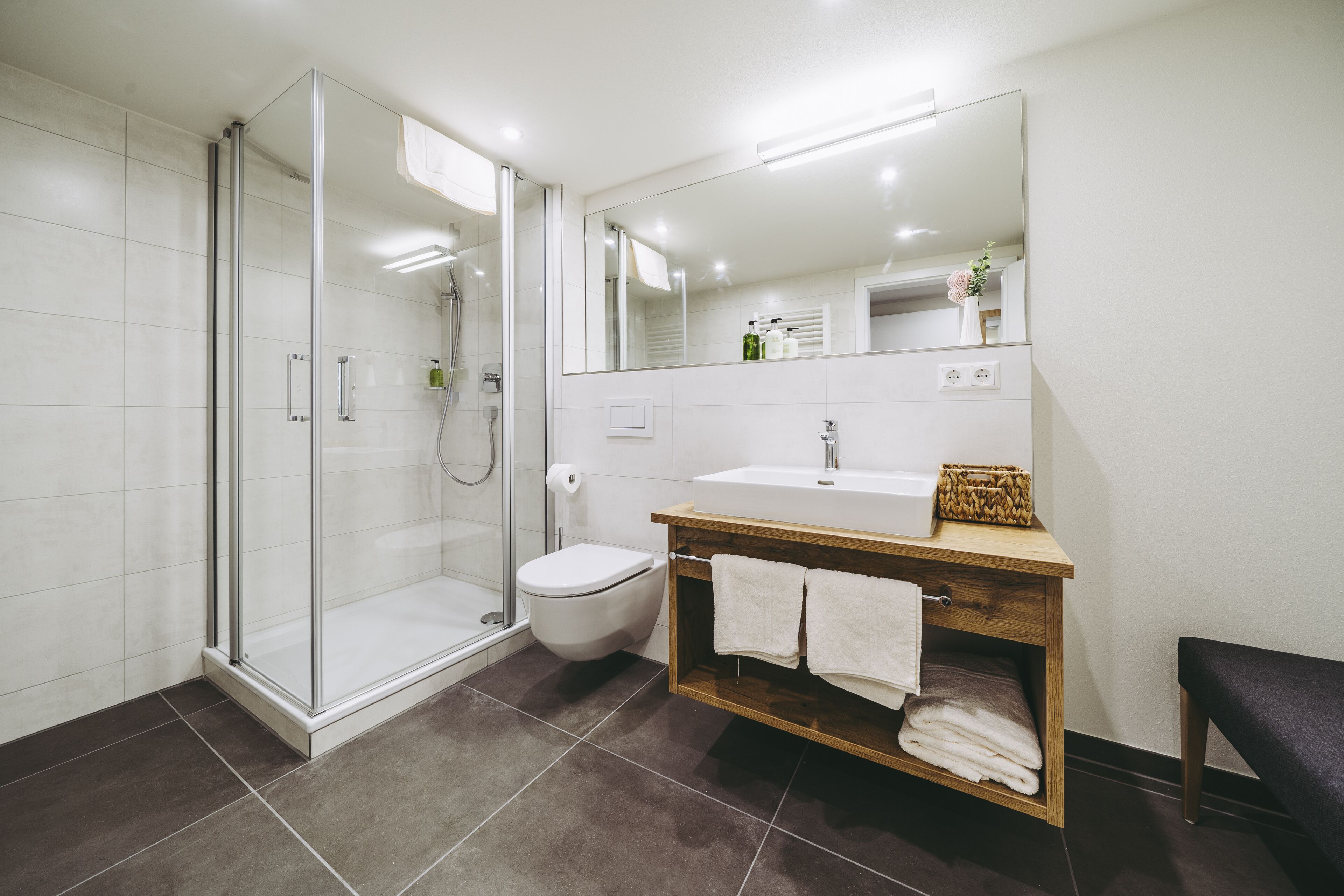 shower, eco-friendly toiletries, hair dryer, towels