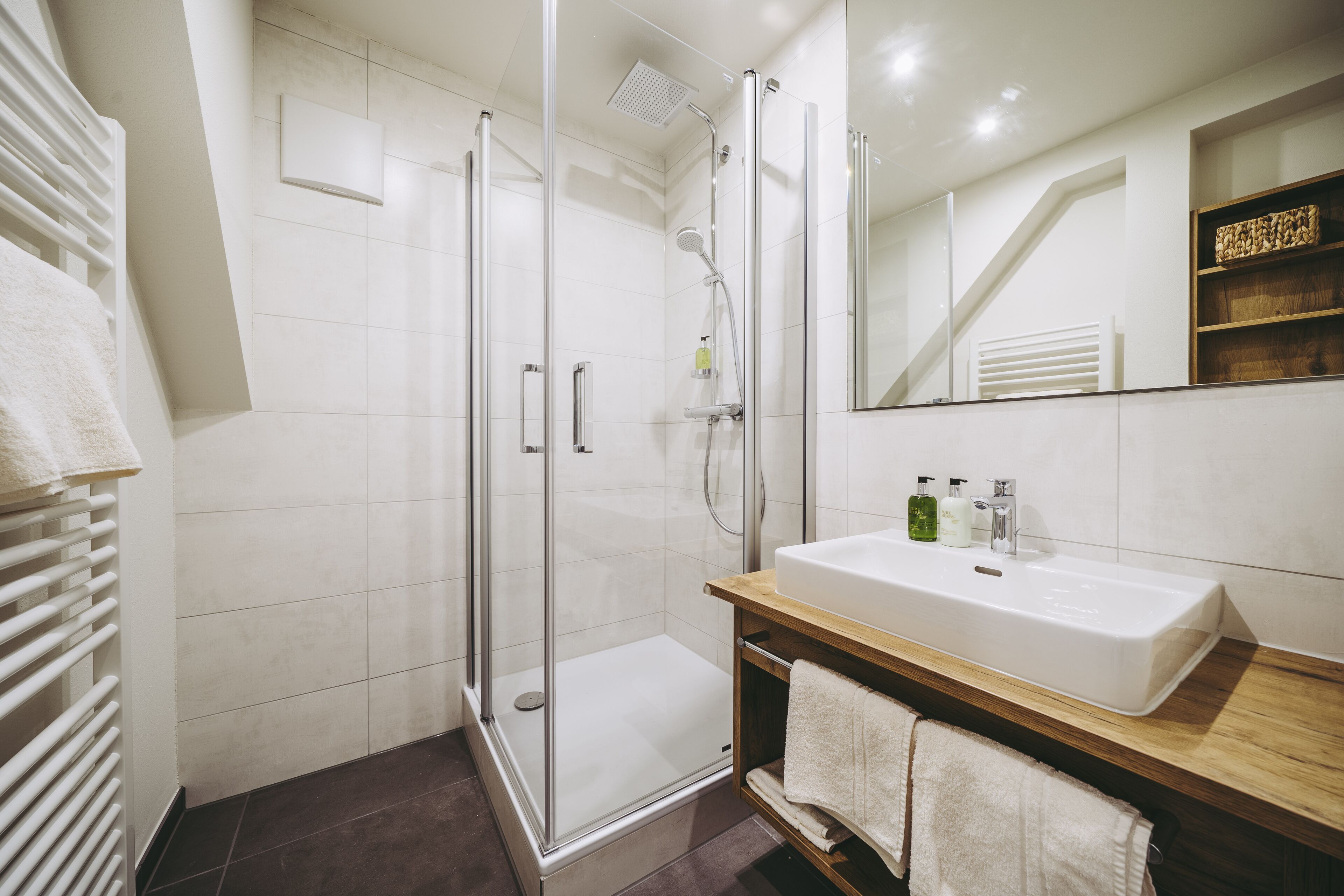 shower, eco-friendly toiletries, hair dryer, towels