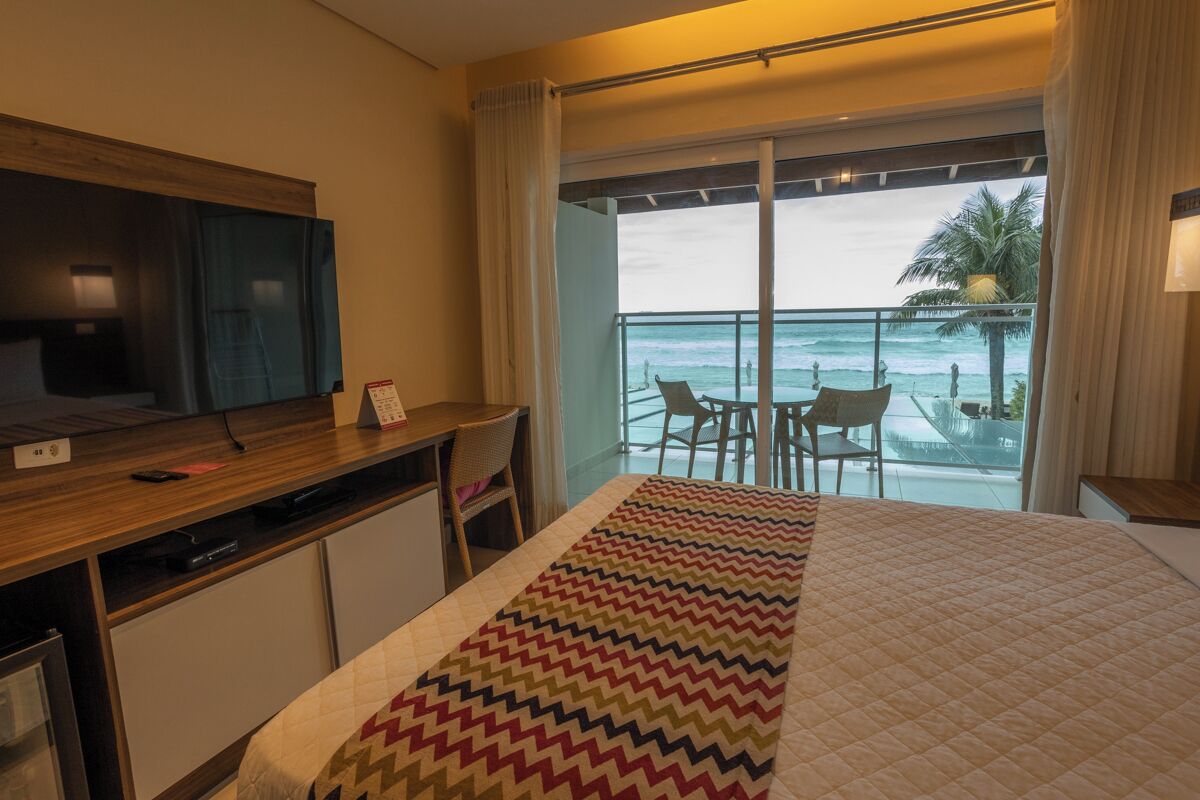 Dúplex, frente al mar | Minibar, caja de seguridad en la habitación y cortinas blackout 