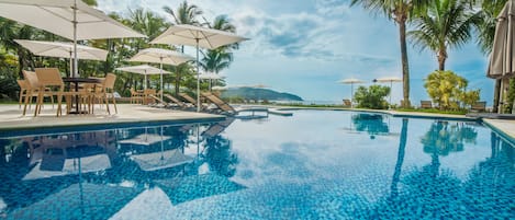 Outdoor pool, pool umbrellas, sun loungers