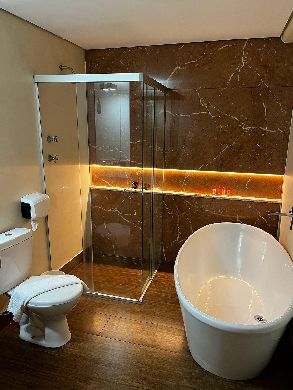 luxury suite | bathroom | shower, free toiletries, hair dryer, towels