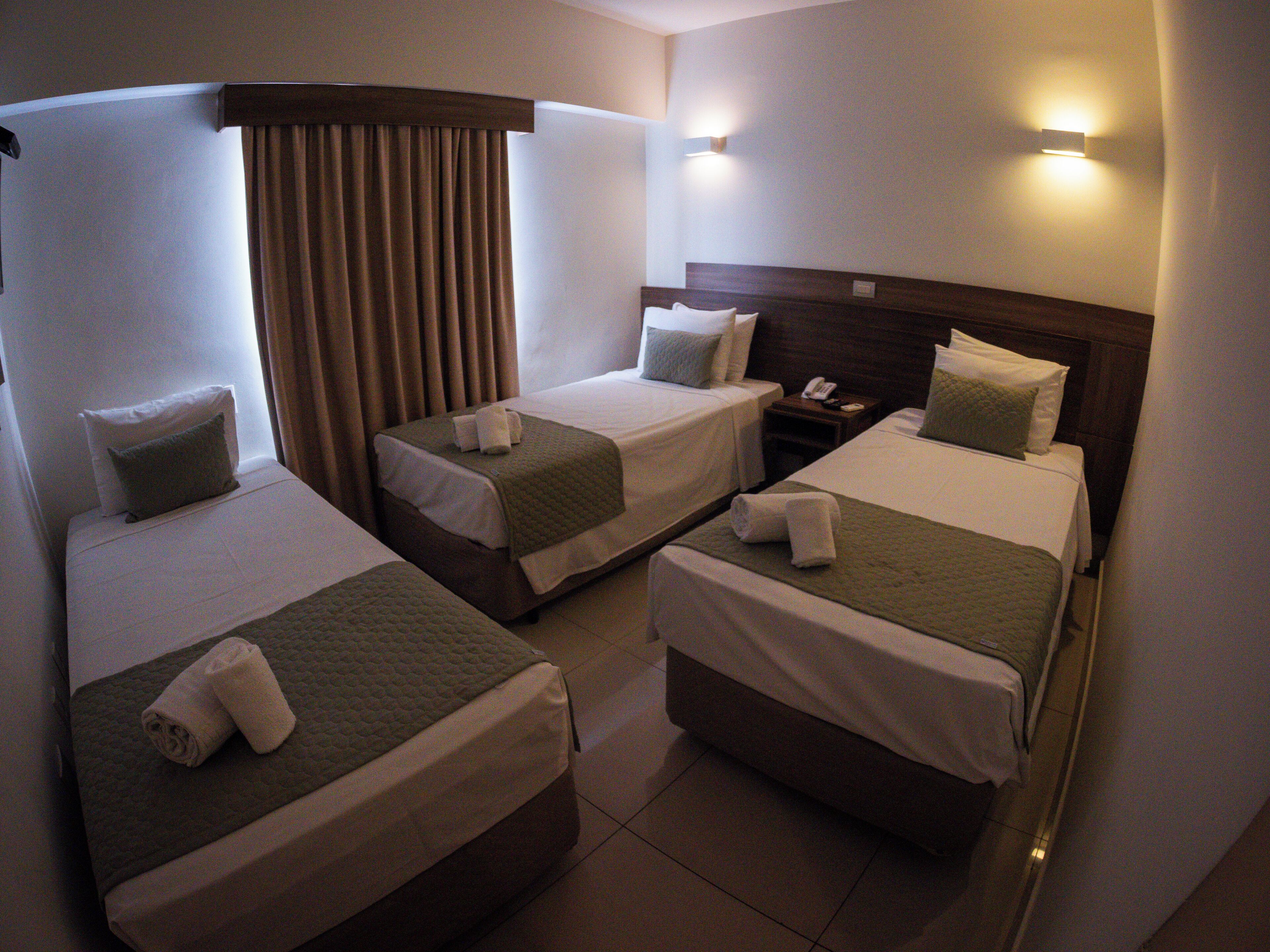 superior triple room, 3 single beds | 1 bedroom, minibar, desk, laptop workspace