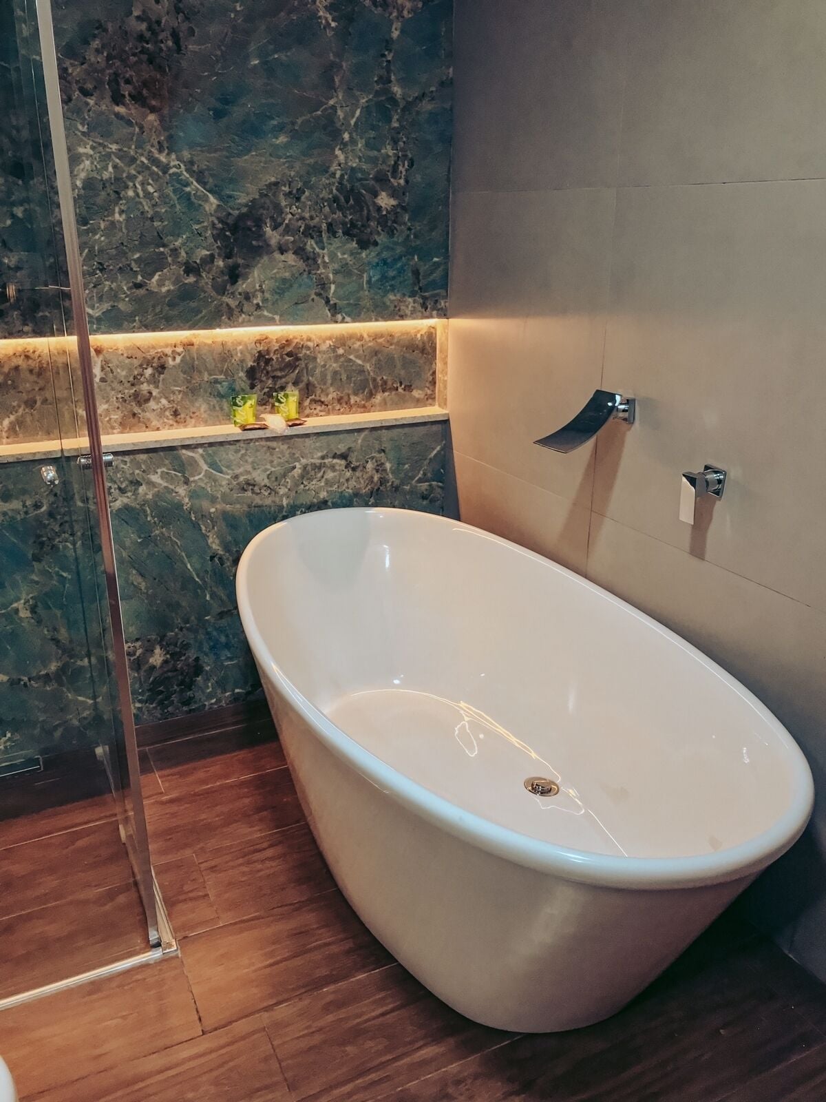 luxury suite | bathroom | shower, free toiletries, hair dryer, towels