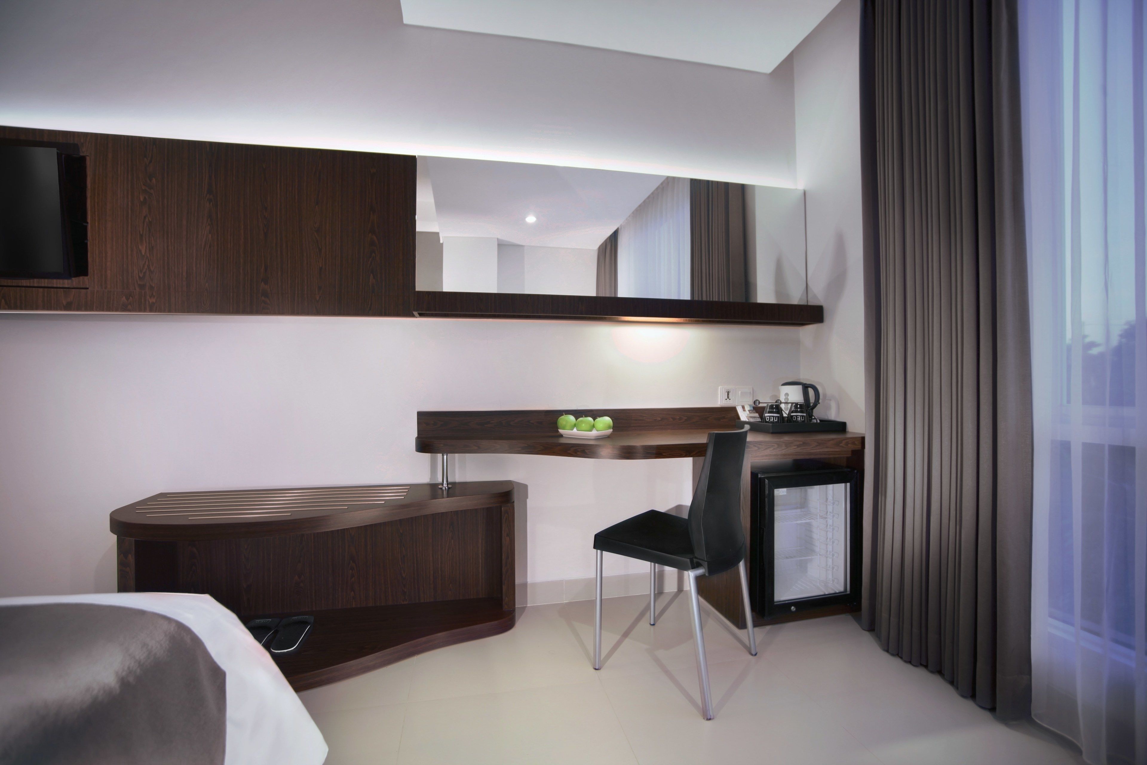 deluxe room | minibar, in-room safe, desk, laptop workspace