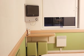 Desk, laptop workspace, free WiFi, bed sheets