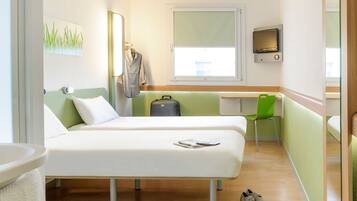 Desk, laptop workspace, free WiFi, bed sheets