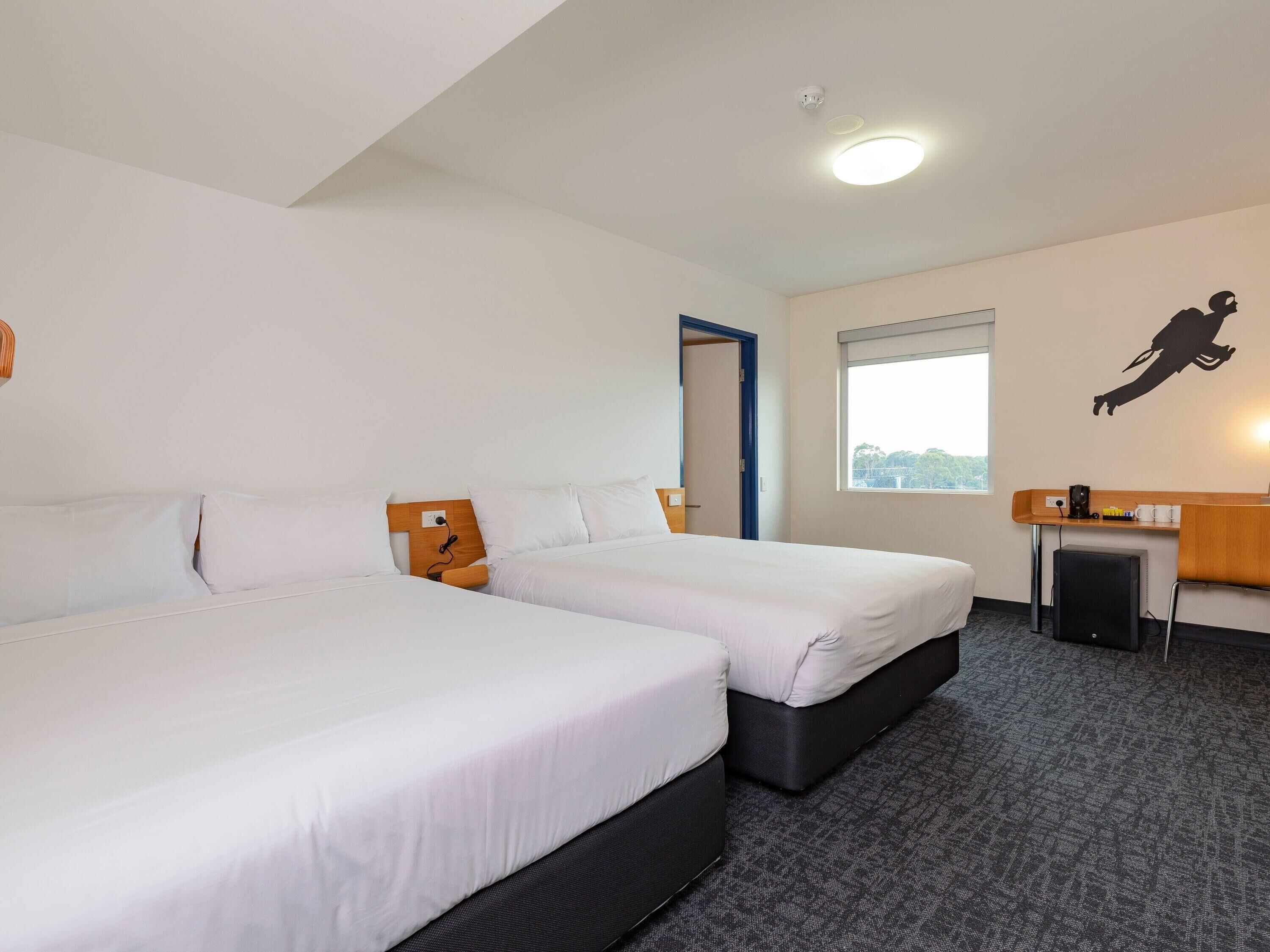 Standard Room, 2 Queen Beds | Blackout drapes, free WiFi, bed sheets