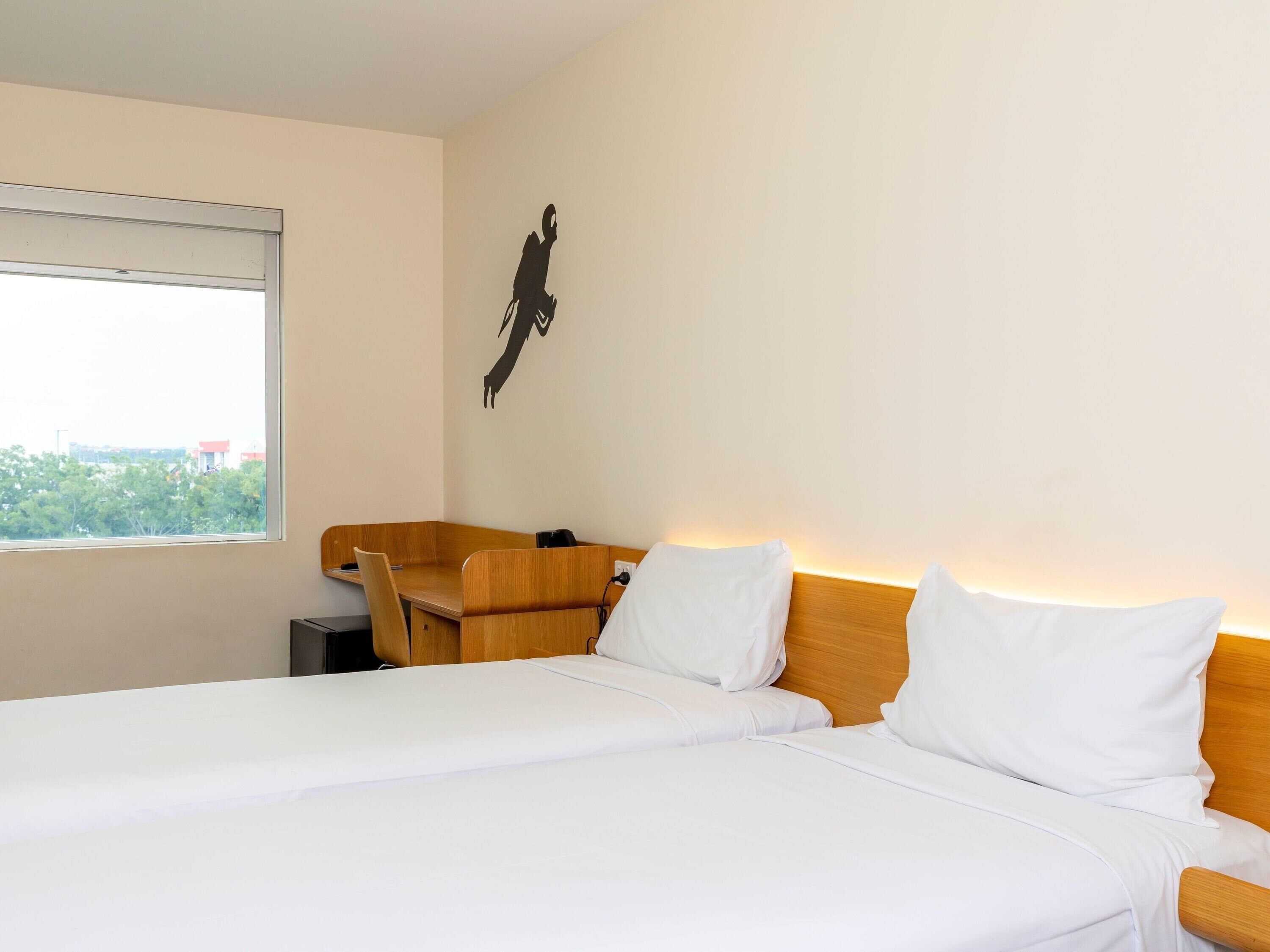 Chambre Standard avec lits jumeaux, 2 lits jumeaux | Rideaux d’obscurcissement, accès au Wi-Fi (inclus), literie fournie