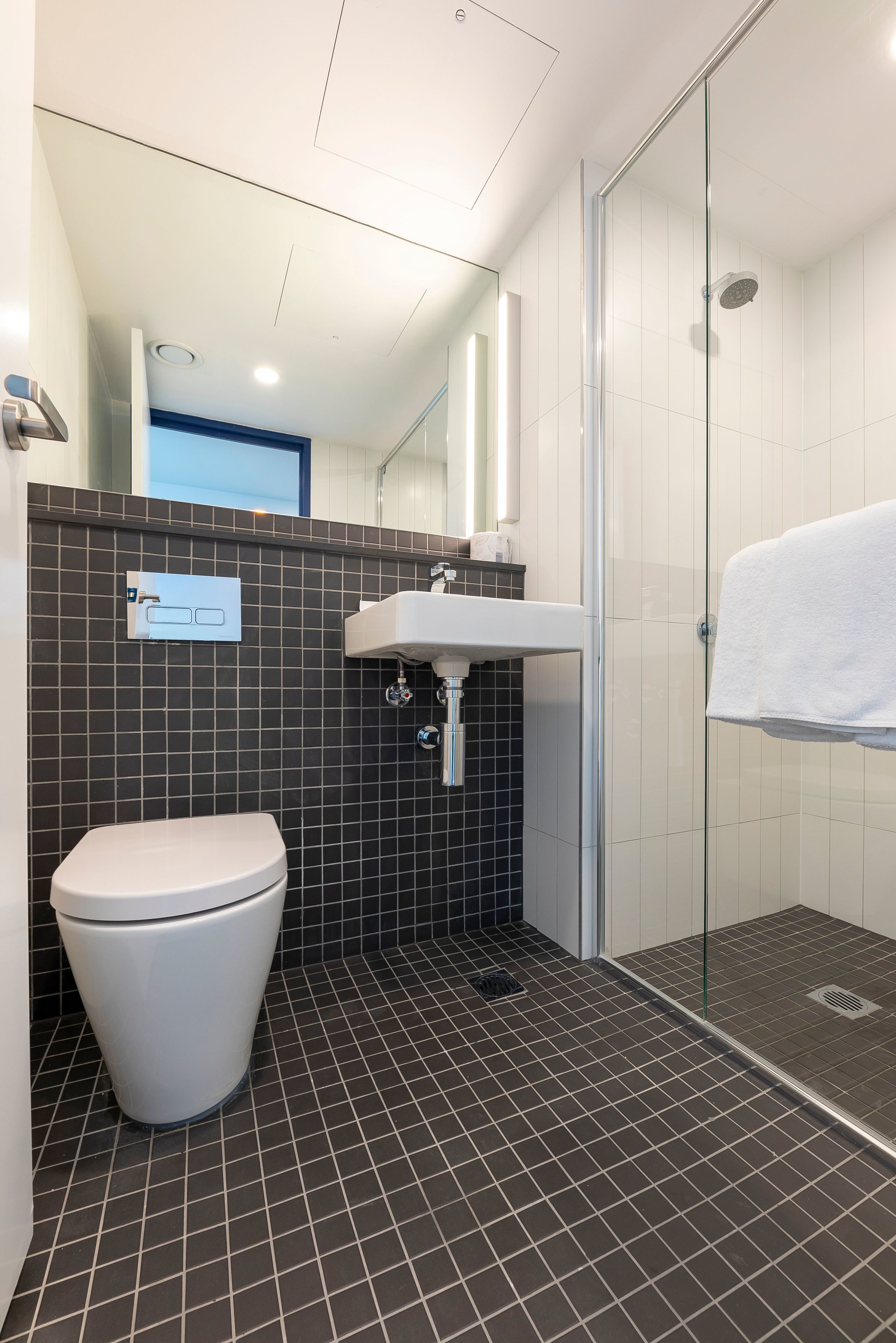 Shower, eco-friendly toiletries, hair dryer, towels