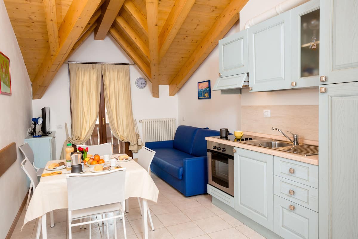 Apartment, 2 Bedrooms | Private kitchen | Oven, stovetop, cookware/dishes/utensils