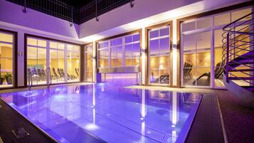 Indoor pool, outdoor pool, pool umbrellas, pool loungers