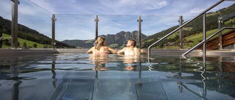 Indoor pool, outdoor pool, pool umbrellas, sun loungers