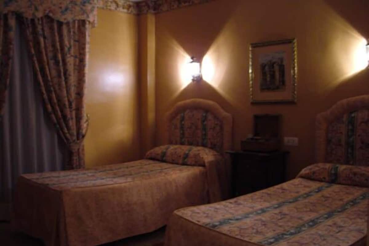 Double Room | Minibar, in-room safe, desk, blackout drapes