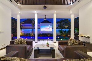 D&G Villas | Living area | 32-inch LCD TV with cable channels, TV, iPod dock