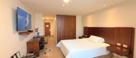 Premium bedding, down comforters, in-room safe, desk